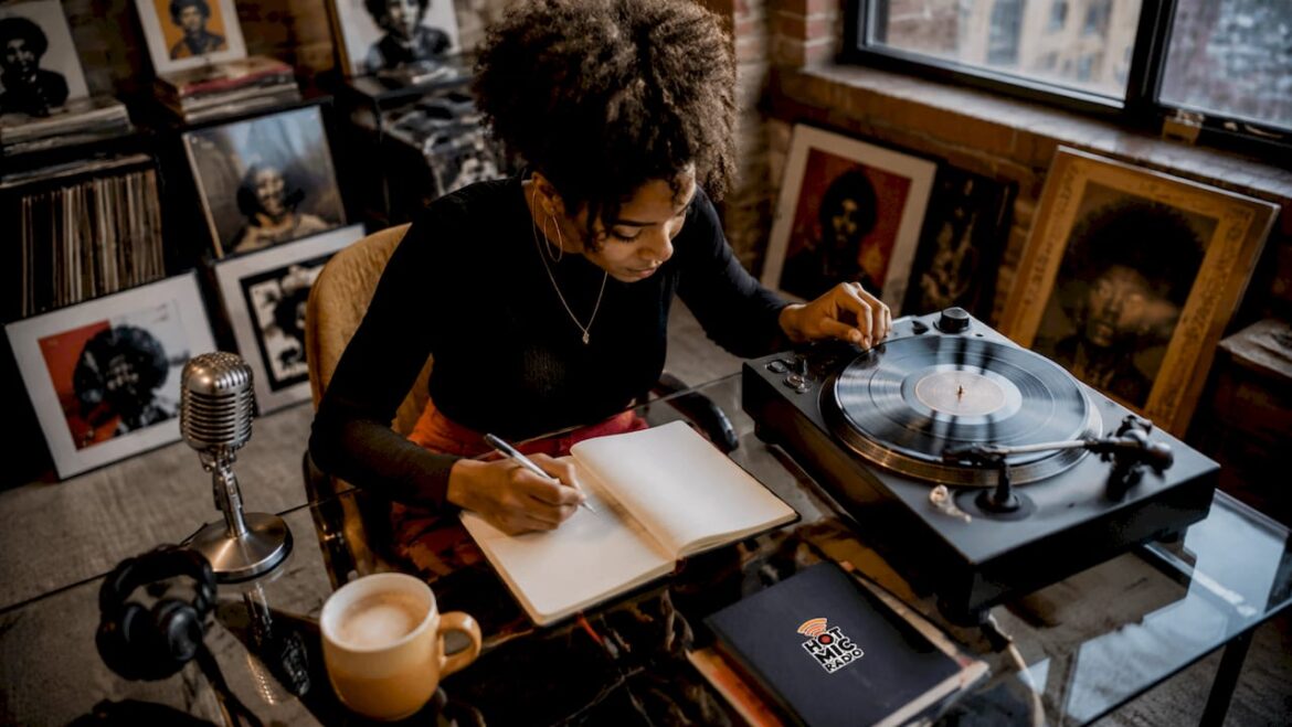 Music historian listening to vinyl record