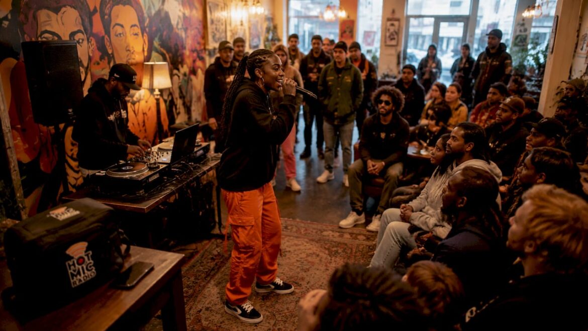 Hip hop artists performing in urban park outdoors