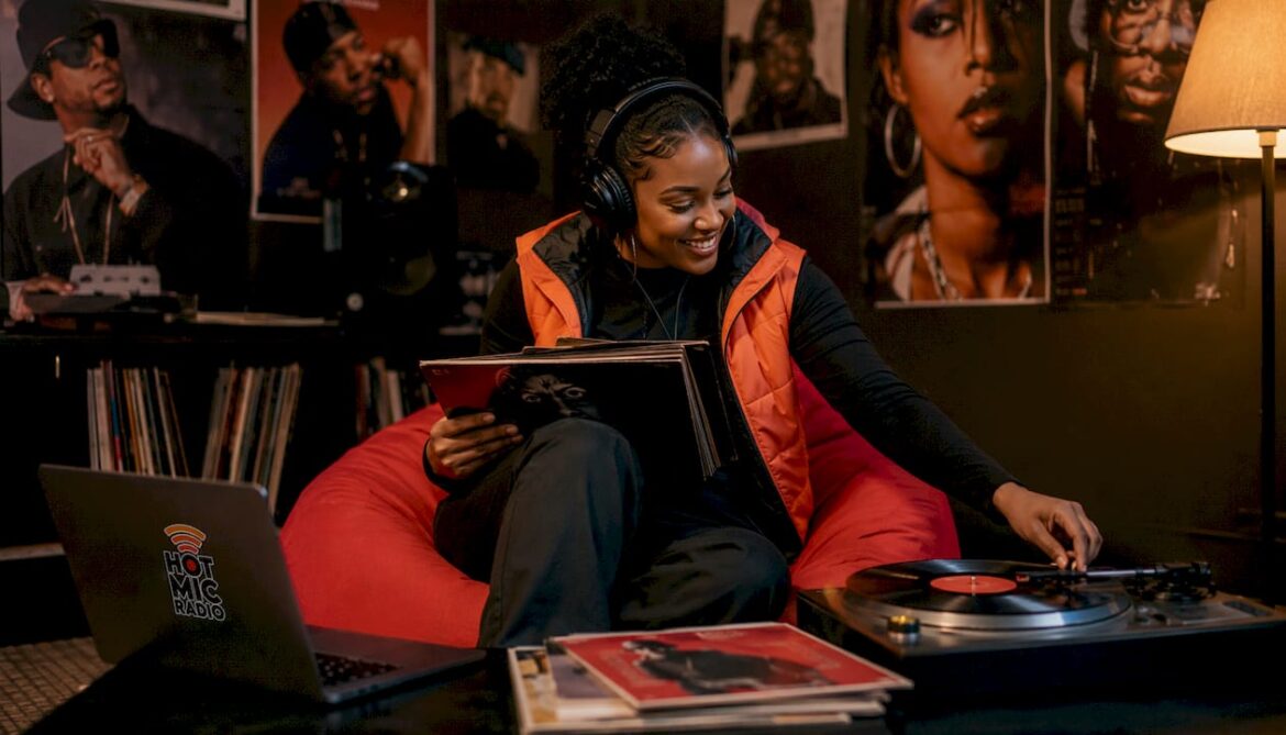 Woman listening to R&B music at home