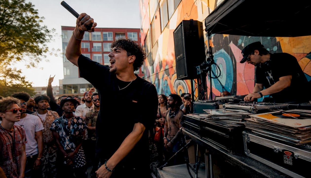 French hip hop MC performing in underground club