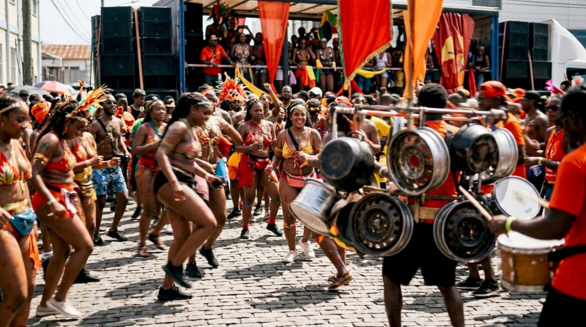 Carnival crowd dancing to soca music outdoors