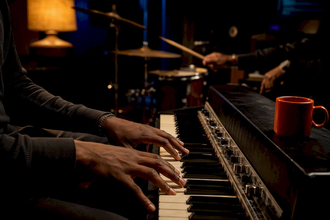 Musician voicing chords in recording studio