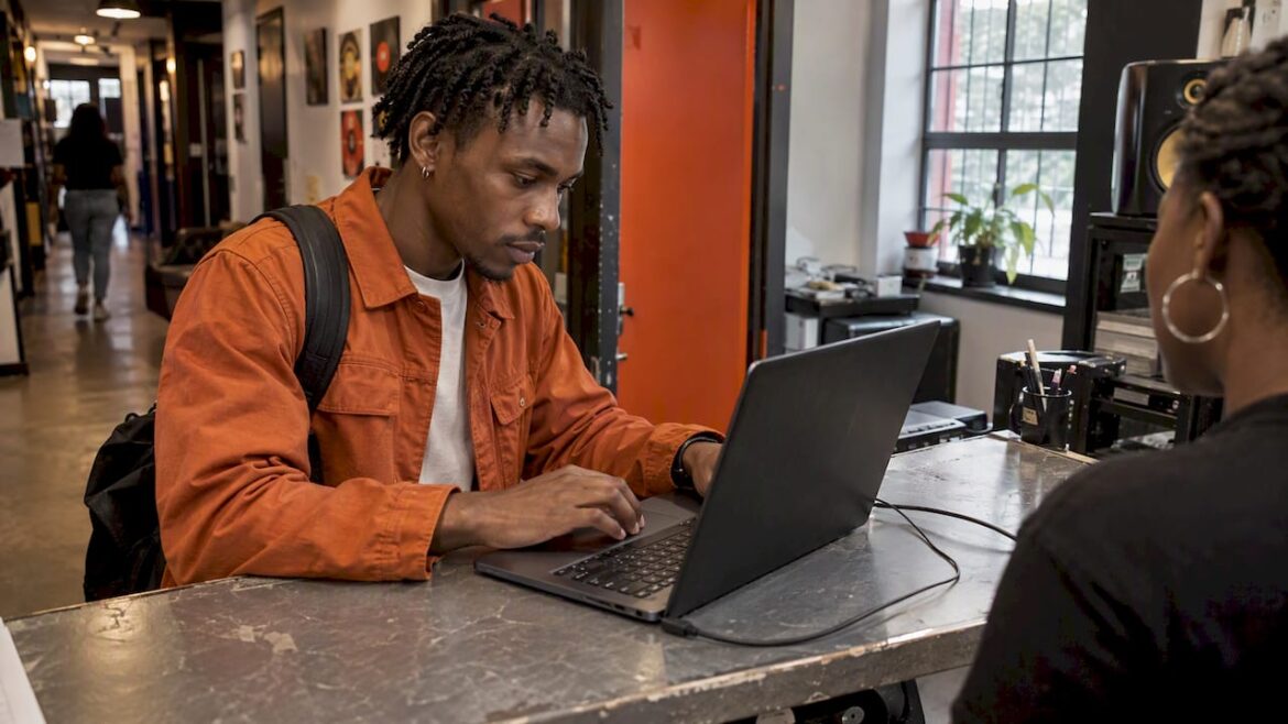 Soca artist submitting a track at community radio